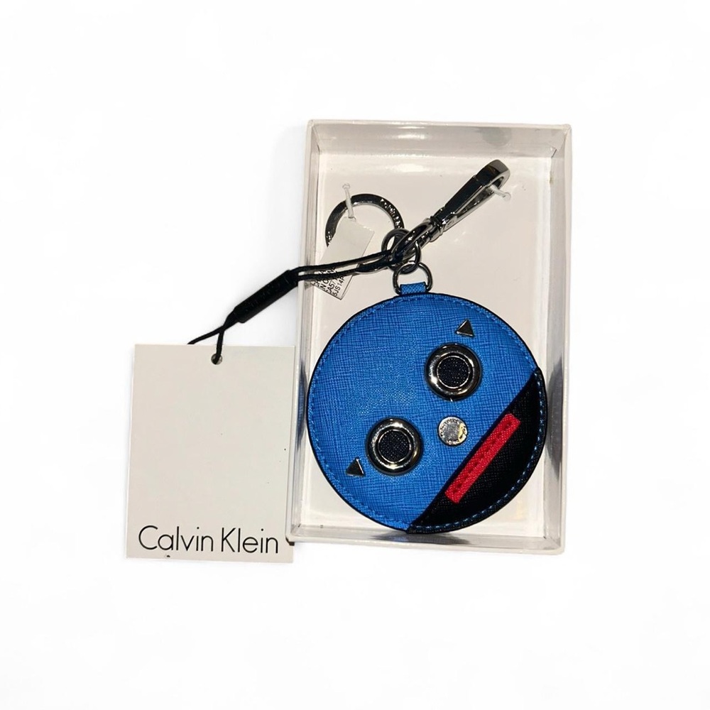 Calvin Klein Blue Smiley Face Keychain Charm with Red Accent nwt